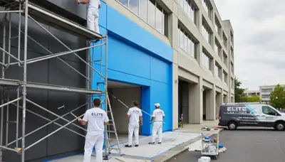 Professional commercial painters working on business exterior in Long Beach, CA